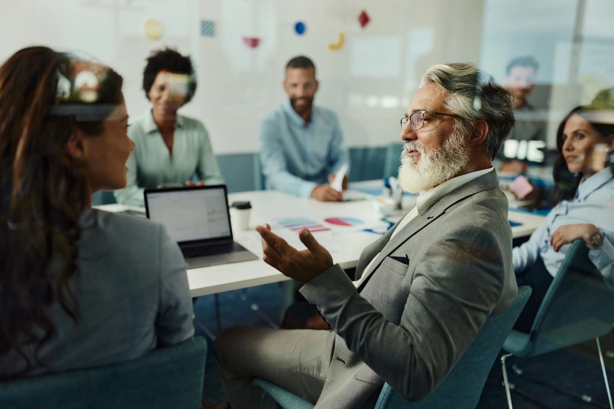 Business team in a meeting room discussion.