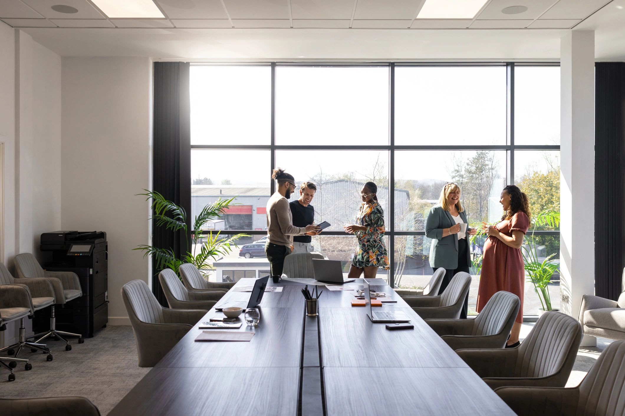 People having a meeting in conference room.